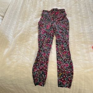 Never worn size two lululemon leggings. Fun floral print